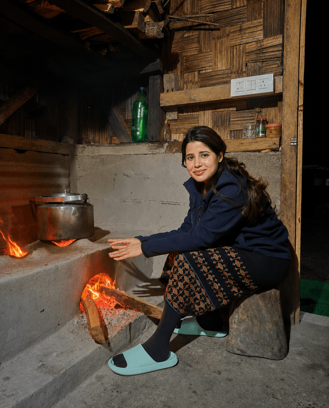 A local family sharing a meal in a Sikkim village home.